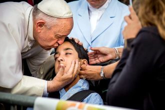Pope with disabled children